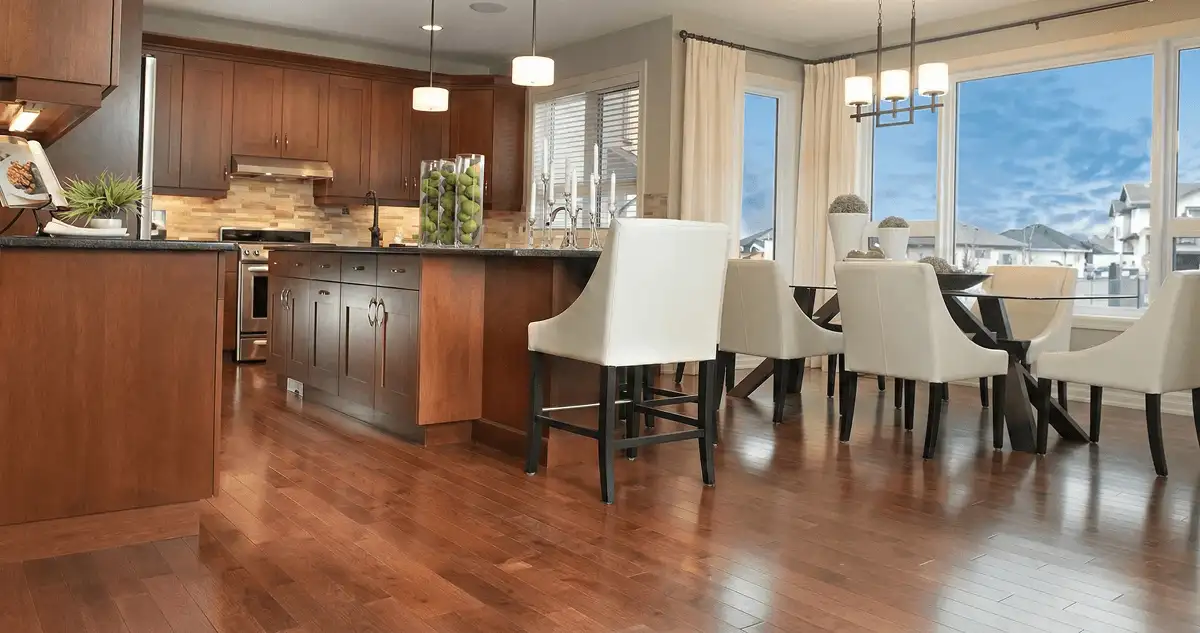 A modern kitchen with professionally installed wood flooring in Chandler, AZ