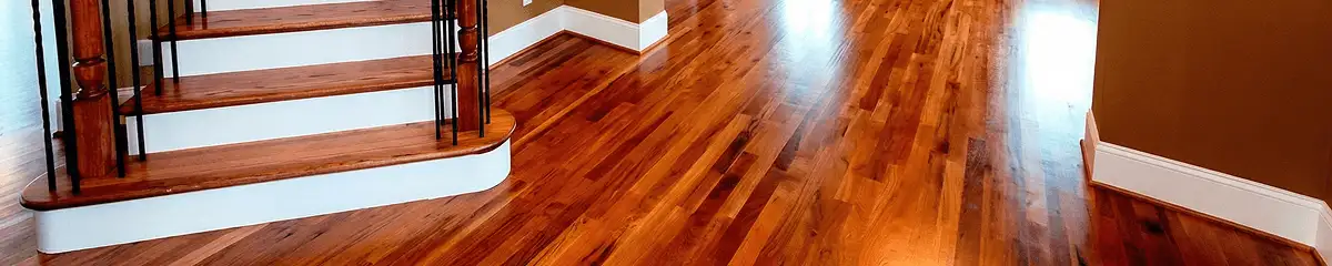 Base floor of a staircase with professionally restored wood flooring in Chandler AZ