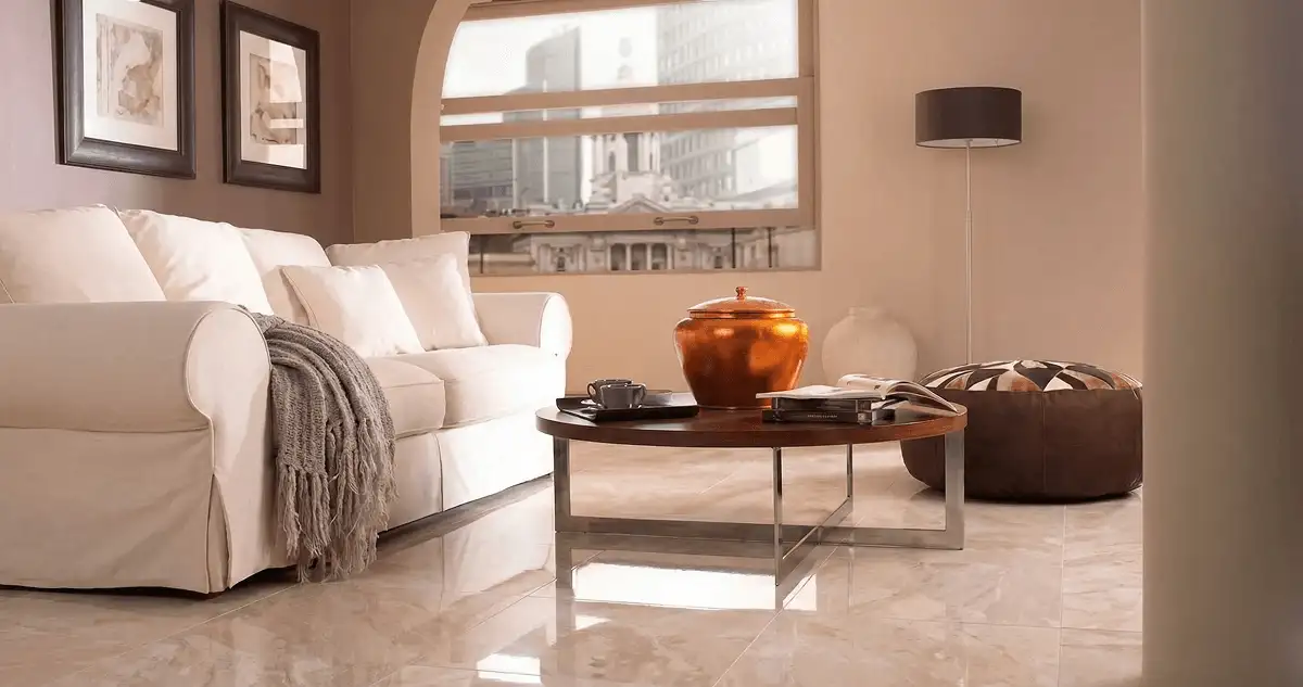 Modern living room with professionally installed marble flooring, a beige sofa, coffee table in Chandler, AZ