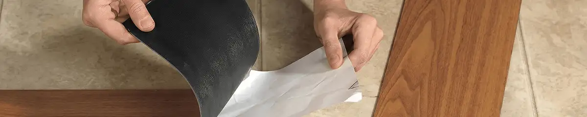 A professional installing vinyl flooring in Chandler, AZ